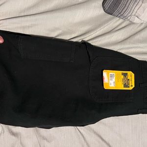 Carhartt lot. 1 pair of 33x30 pants, 2 pairs of gloves. Everything is brand new!